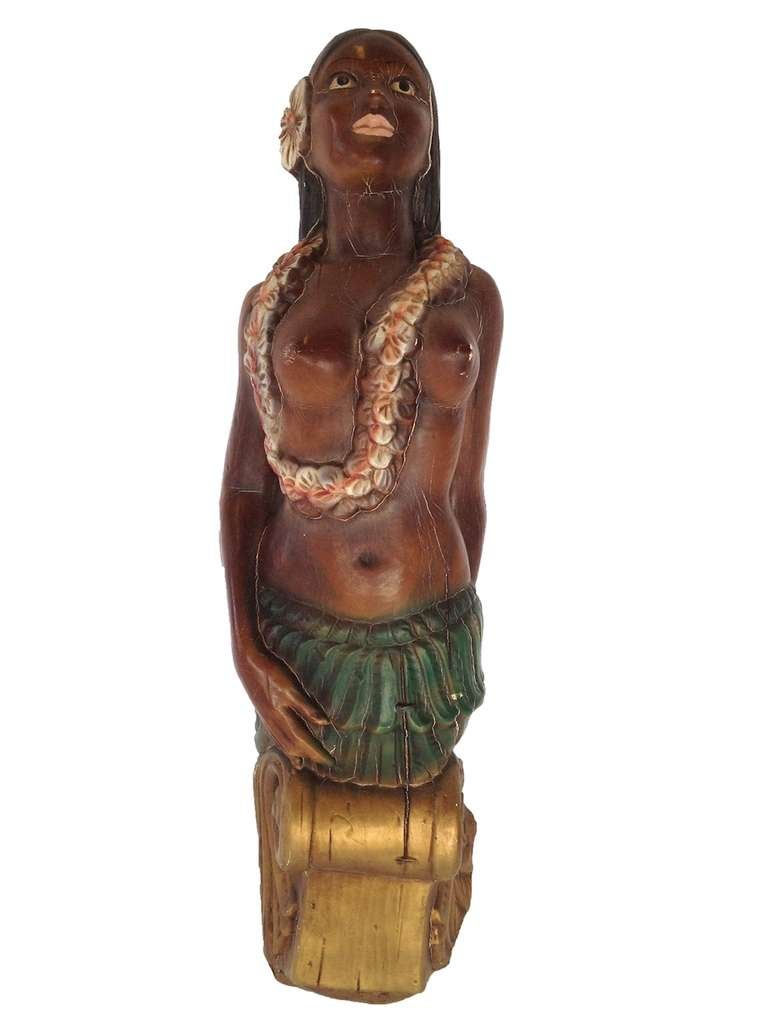 Unusual Vintage Wall Mount Statue of a Hawaiian Woman.  Constructed of Foam with very nice painted details.  Shows notable cracking to paint and to foam as pictured but still shows very nicely.  Notable split to foam on one side of the head (see
