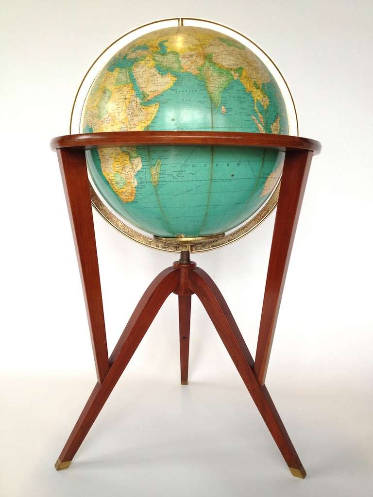 Dunbar Illuminated Floor Globe by Edward Wormley.  Globes light up and rotates.  Very minor wear to globe as pictured.  