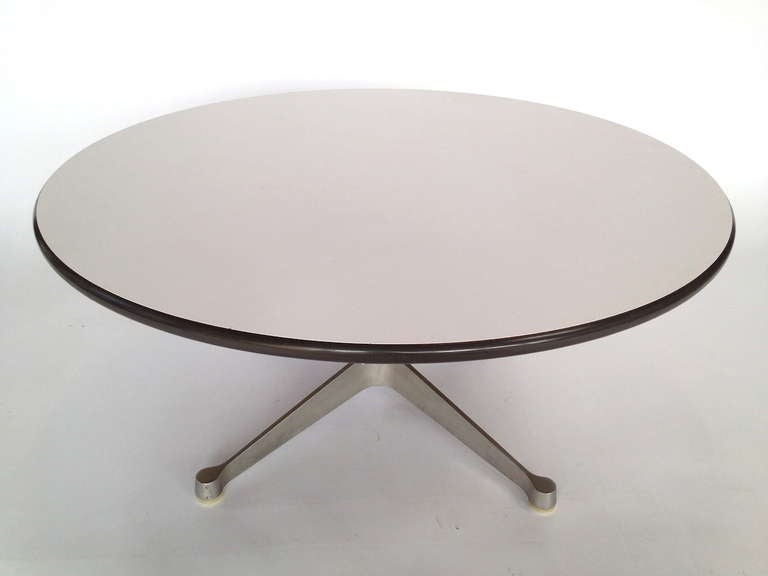 Eames Aluminum Group Coffee Table for Herman Miller.  A classic Eames table ideal for home or office use.  Laminate top has minor wear from use (light scratches) but shows nicely.