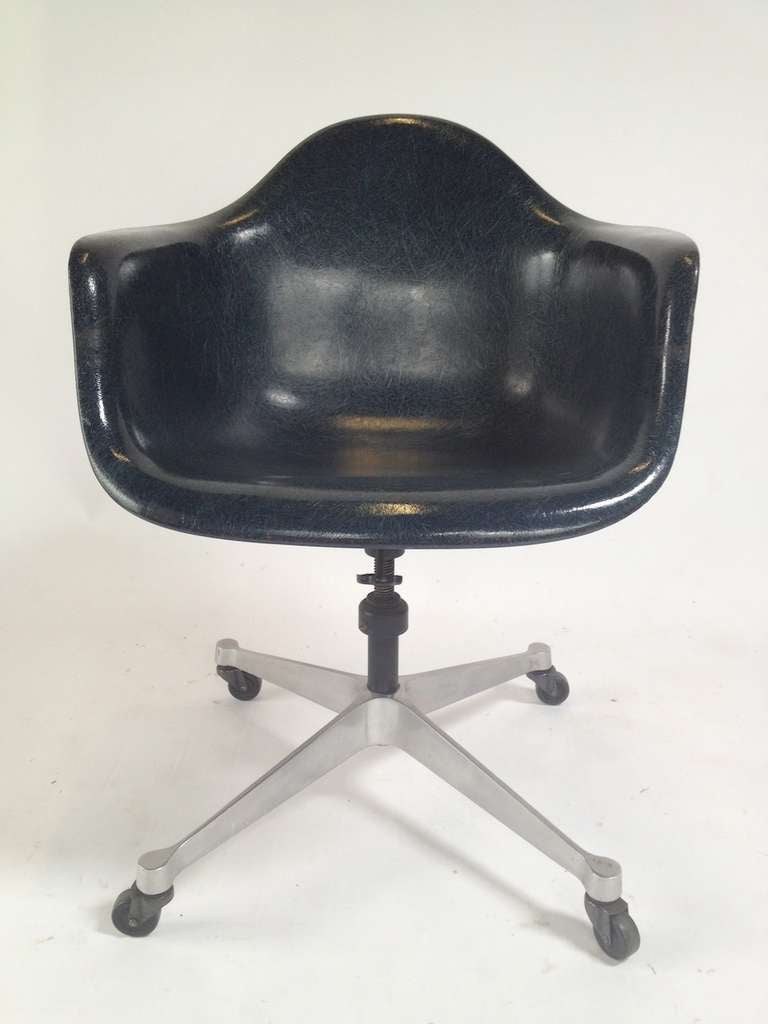 Charles Eames Dash 99 Tilt/Swivel Office Desk Chair for Herman Miller.  Beautiful fiberglass shell in a hard to find dark blue color.  Very nice original condition with Herman Miller labels on the underside.  Some very minor wear from use as