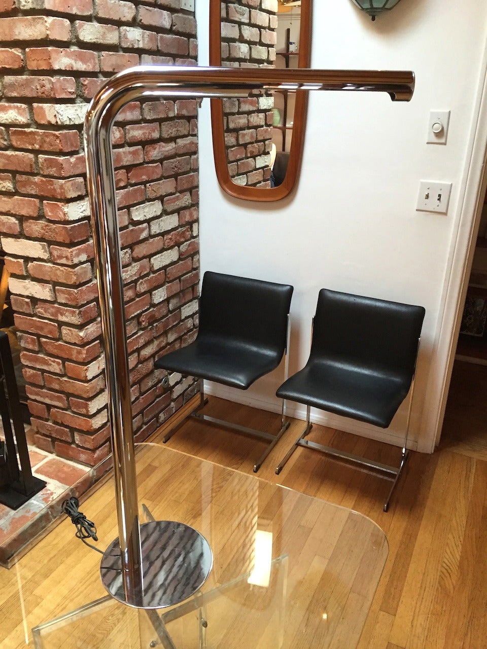 Chrome floor lamp by Sonneman. Good original condition with minor age appropriate wear to chrome as pictured.