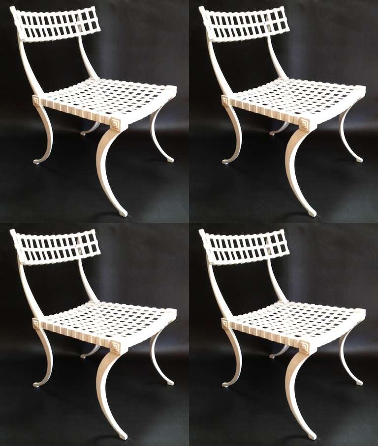 Set of 4 Thinline Klismos Style Outdoor Patio Chairs. Original as found condition. Some flaking paint. Structurally all 4 chairs are in excellent condition. For use as-is or for restoration. No cushions are included.