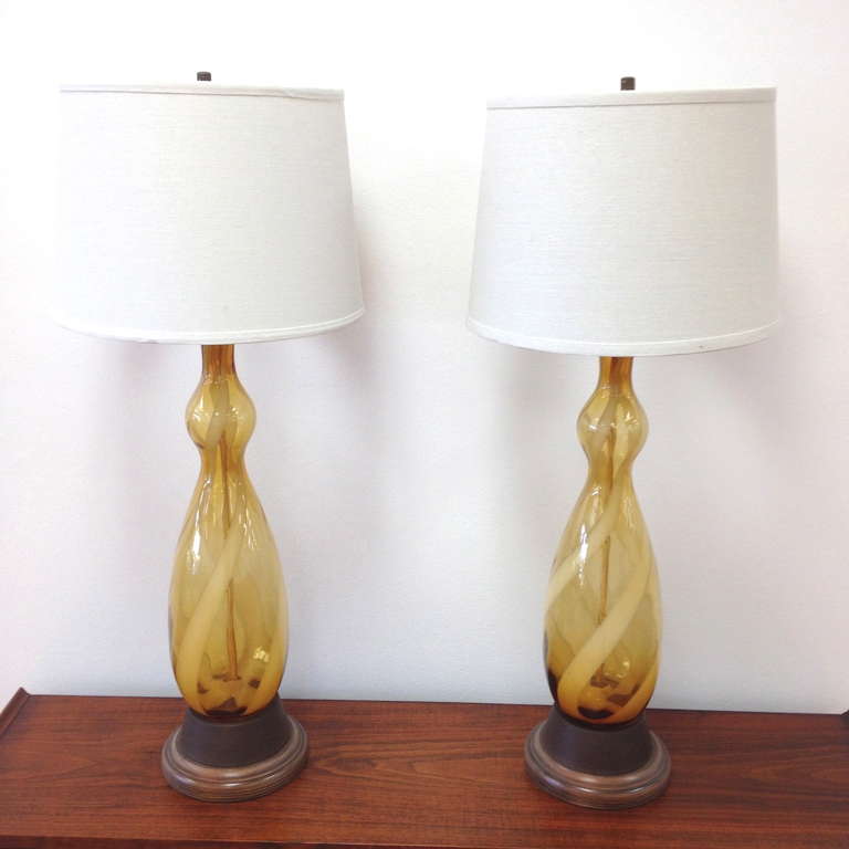 Exceptional Pair of Murano Glass Table Lamps.  Very nice condition with newer shades.  lamps were rewired at some point - cord appears to have been relocated as pictured in image 5.