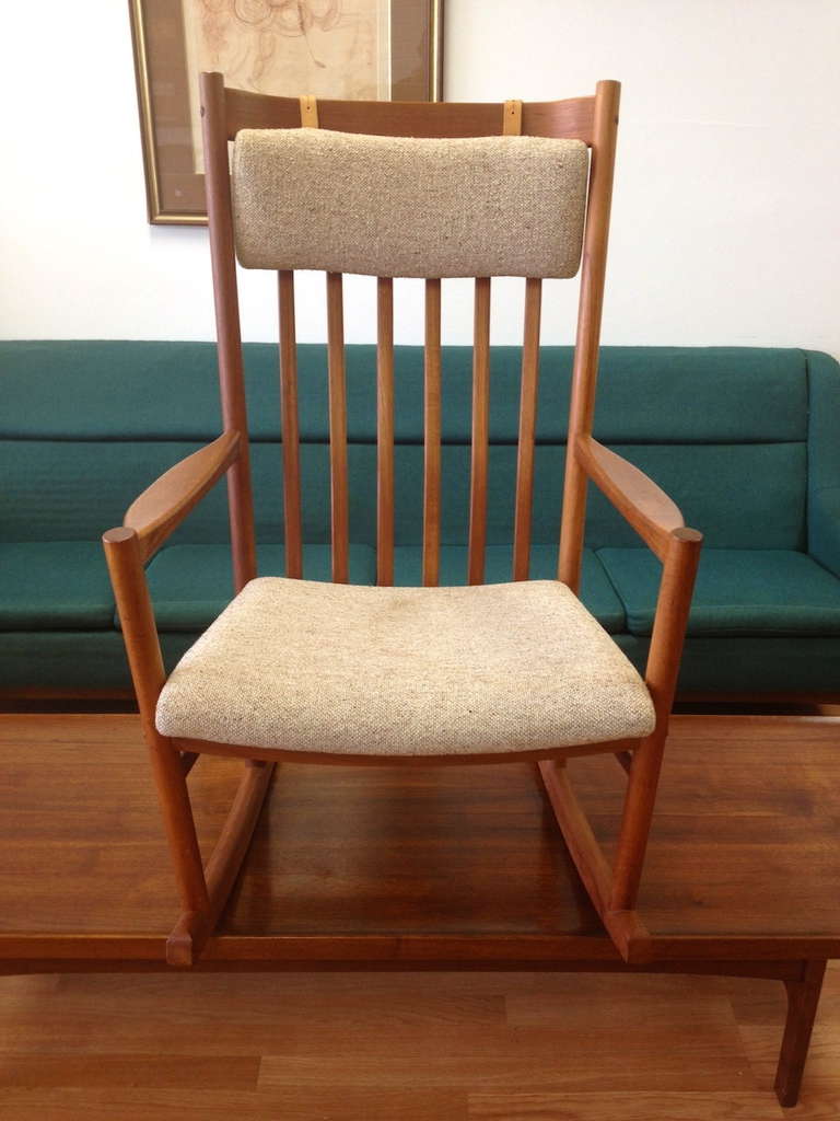 Danish Modern Teak Rocking Chair by Hans J. Wegner for Tarm Stole.  Original condition with some light scratches and very minor soiling to seat as pictured.