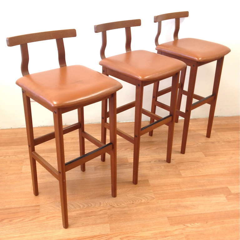 Set of 3 Danish Modern Teak Barstools Made in Denmark by KS.  Original upholstery has some minor wear from use and should be changed to match your decor.