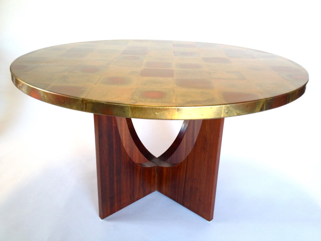 A wonderful Gold Foil Top Dining or Foyer Table on a sculptural solid Walnut base.   Measures 27.25