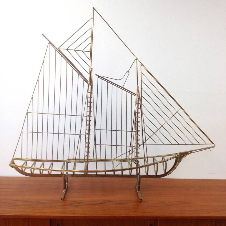 Huge Curtis C. Jere Brass Sailboat Model Sculpture.  Can stand on its own or can be mounted to a wall.  No signature present.  Some wear to brass plating primarily on the underside of the ship and the stand.  Measures approx. 41