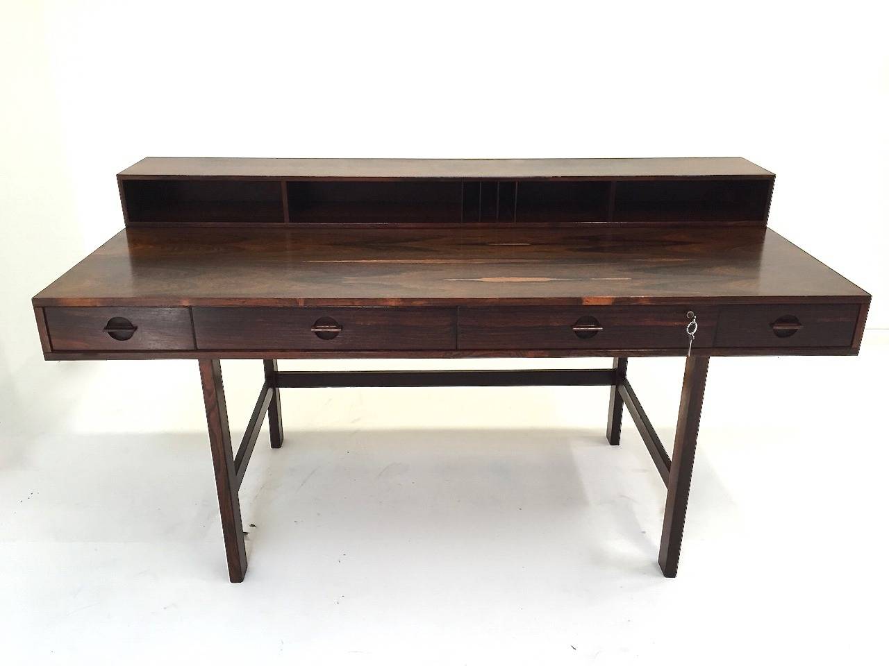 Rare rosewood Jens Quistgaard flip-top partner desk for Løvig. Good original condition with minor age appropriate wear as pictured. Dated 1968. Original keys are included.