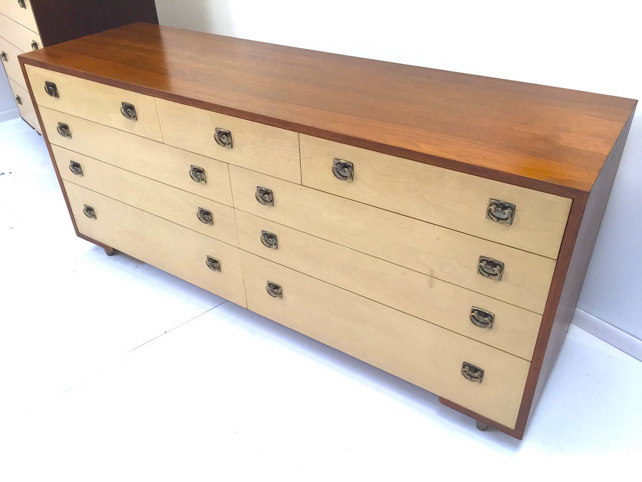 Paul Frankl Dresser Chest of Drawers for Johnson Furniture Company.  Good original condition with some minor wear from use.  Some dings on the top surface as shown.  Sold in as found condition for use as-is or for restoration.  Matching Hi-Boy and