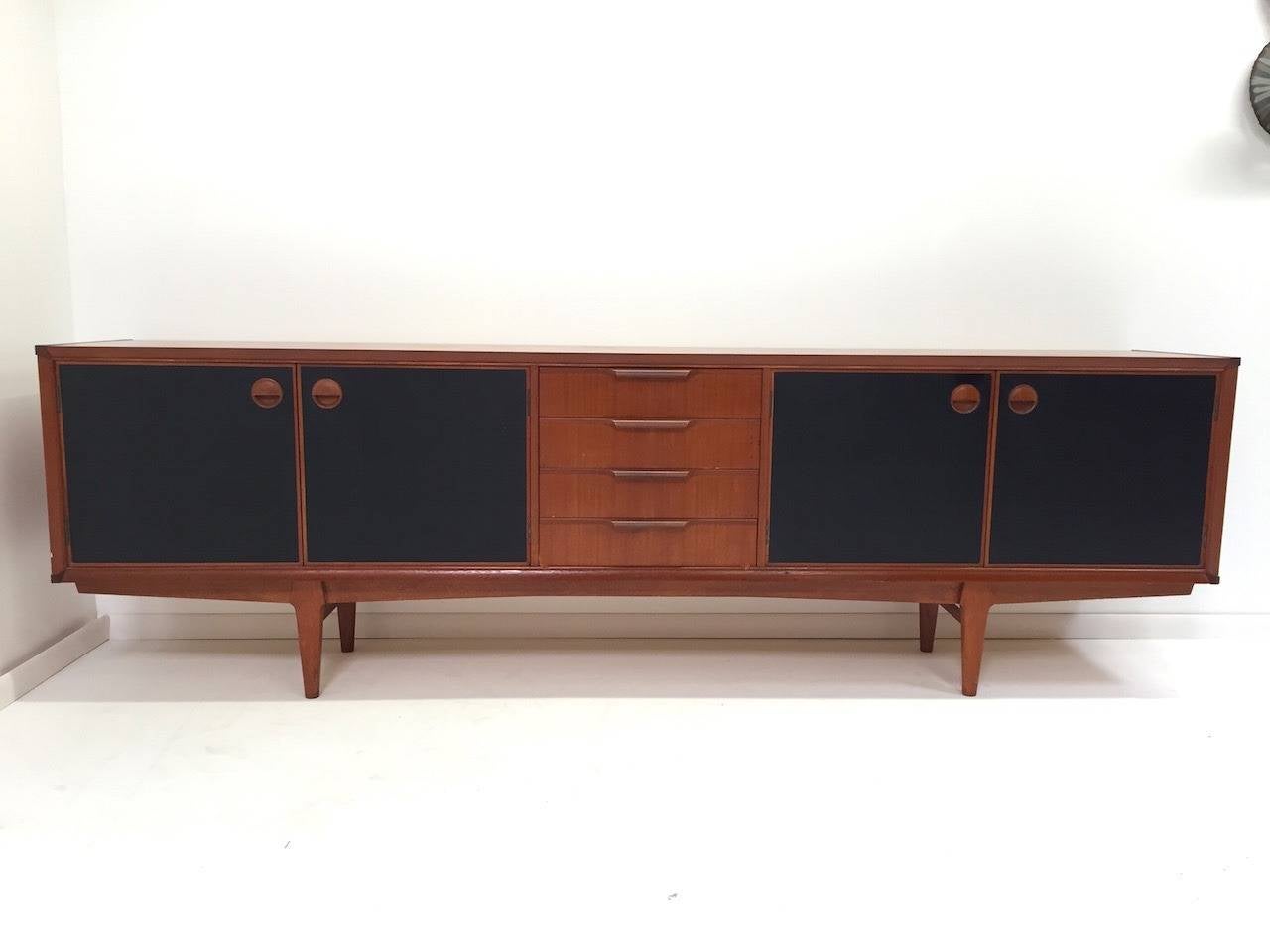 Exceptional Danish Modern Teak Credenza with Black Vinyl Doors
