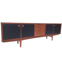 Exceptional Danish Modern Teak Credenza with Black Vinyl Doors