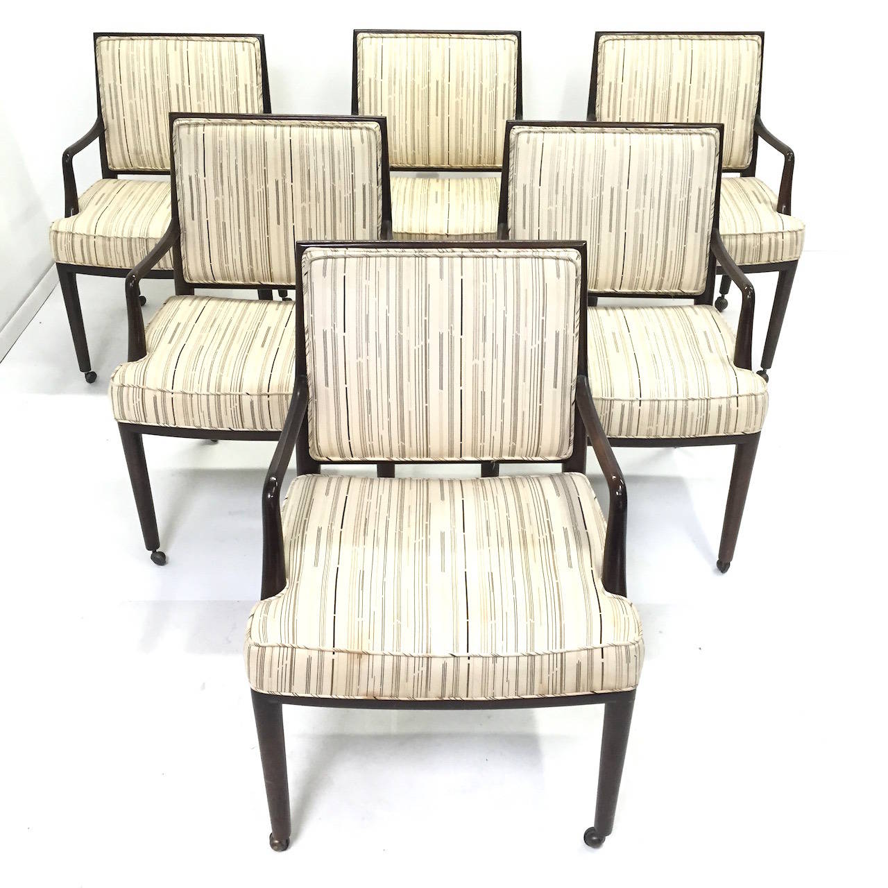 Beautiful Set of 6 Monteverdi Young Dining Chairs.  Very nice original condition.  Upholstery should be changed to match your decor.  Sold in as found condition for reupholstery.  Some of the casters have been replaced, 2 casters need to be replaced.