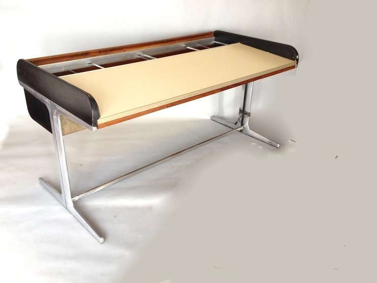 Classic George Nelson Action Roll Top Architects Desk for Herman Miller.  Good original condition.  Roll Top has some scratches as pictured.  Storage section has the original file folder dividers.  2nd Matching Nelson desk and 2 Time Life Chairs