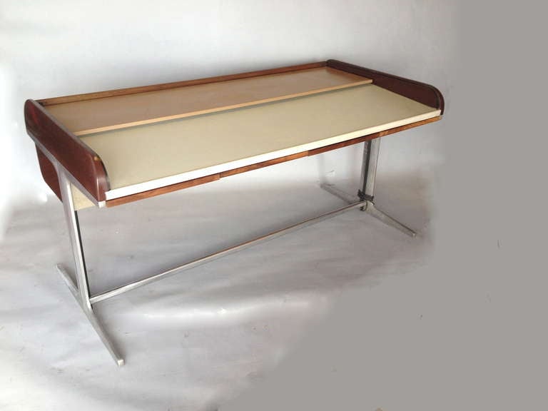 Classic George Nelson Action Roll Top Architects Desk for Herman Miller.  Good original condition.  Sides appear to have been painted brown.  Desk surface has some minor discoloration in areas.  Storage section features a flip top cover as pictured