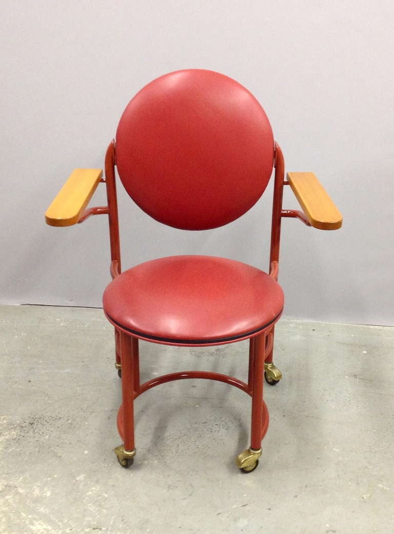 Frank Lloyd Wright S.C. Johnson Wax Arm Chair on Casters for Cassina.  Marked/Copywrighted under arm.  This example c. 2003.  Backrest swivels for comfort.  Good original condition - small ding to armrest and light scratches to leather as pictured.
