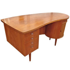 Danish Modern Teak Kidney-Shaped Desk with Built in Bar by Kai Kristiansen