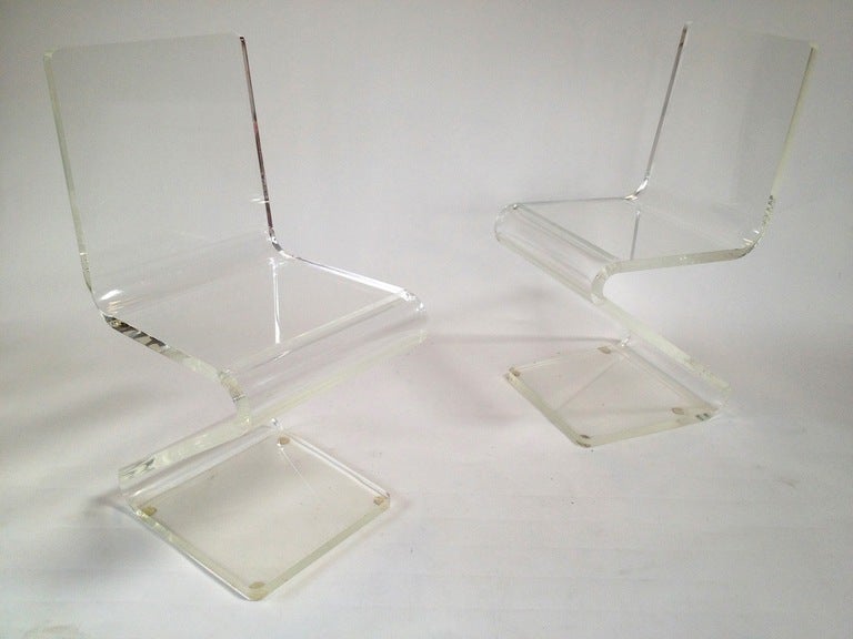 Lucite Zig Zag or Z Accent Side Chairs attributed to Charles Hollis Jones.  Very nice original condition with expected surface scratches to the underside of the chair base from use.  (Can likely be polished out) 