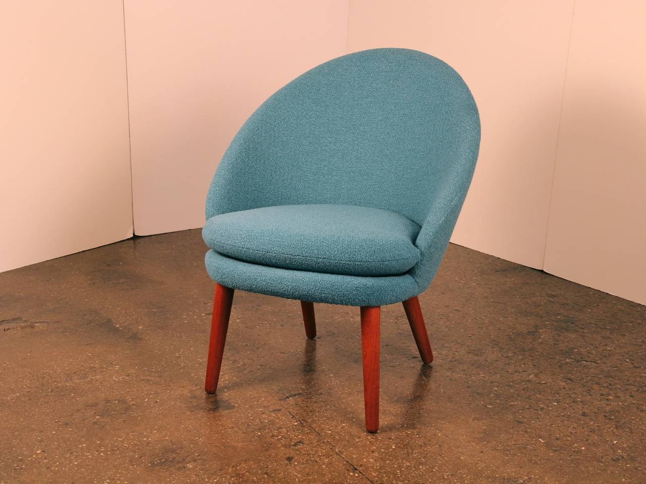 Danish modern easy chair strikes an elegant pose. This beauty is newly recovered in Knoll Classic Bouclé in Aegean. Teak legs have a hand-rubbed oil finish. Designed by Ejvind Johansson. Denmark, 1950s.

25