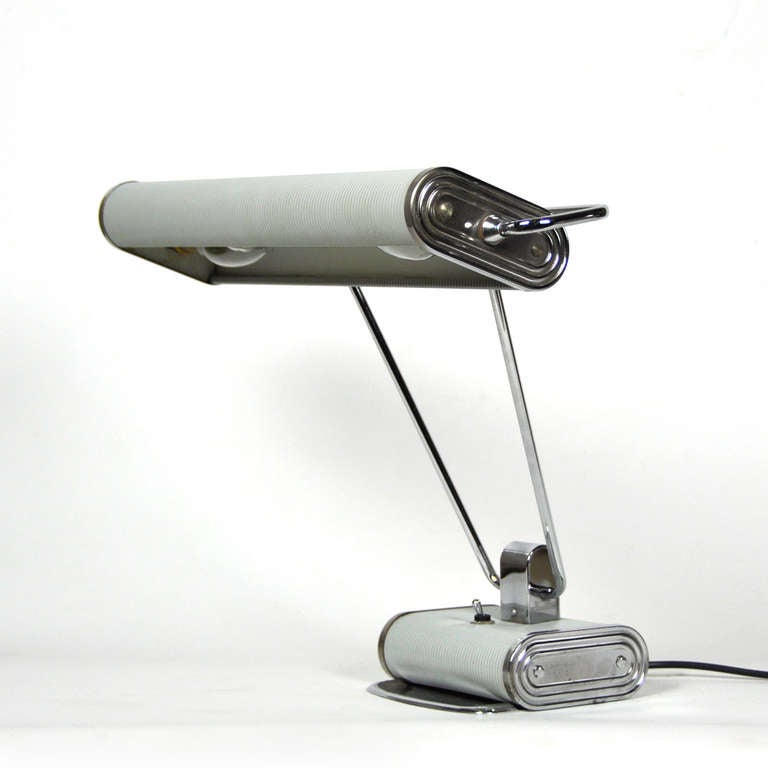 Desk lamp designed by Eileen Gray, to 30-40, by JUNO.