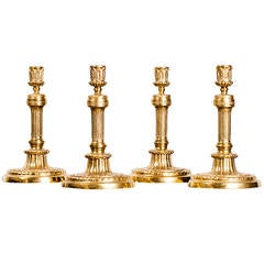 Set of Four Bronze Candlesticks