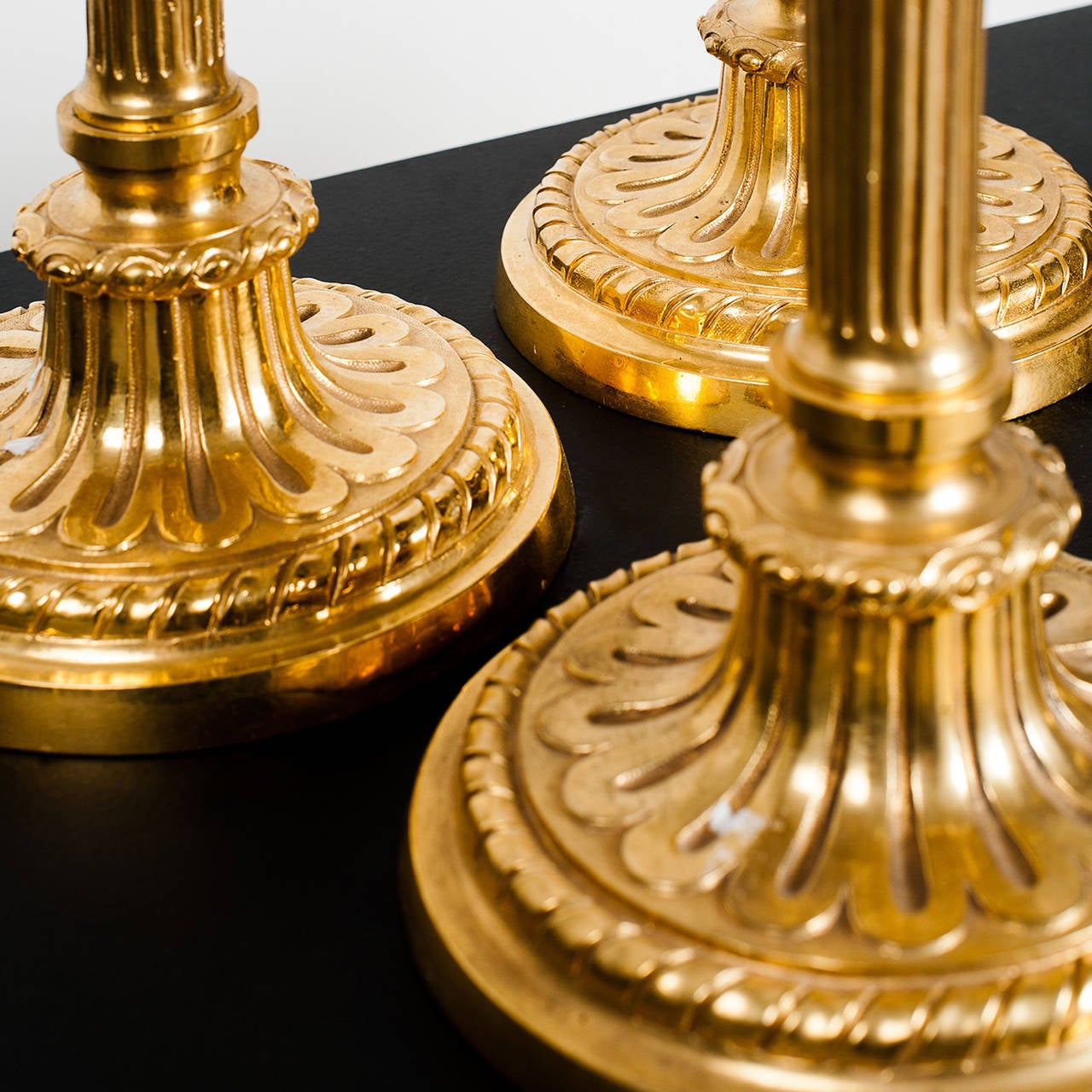 Louis XVI Set of Four Bronze Candlesticks
