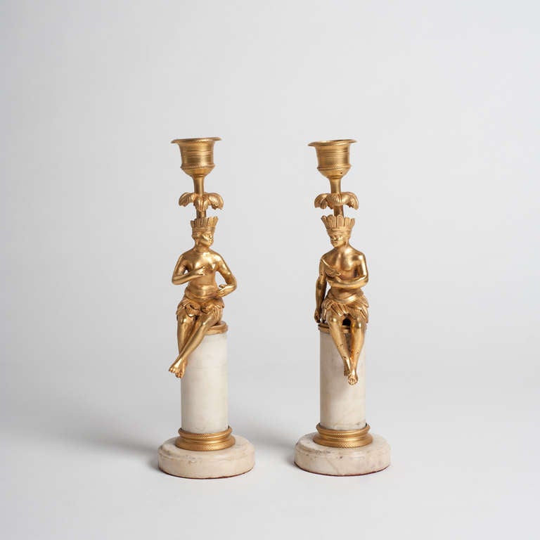 Nice pair of candlesticks, representing some american Indian.Carlos IV style and era