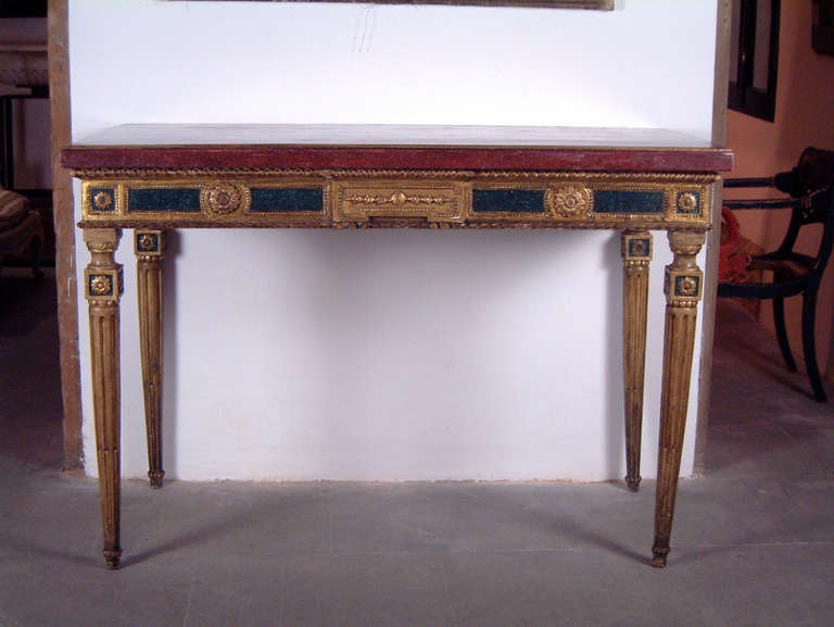Carved polychromed wood.
Wood top in faux- porphyre