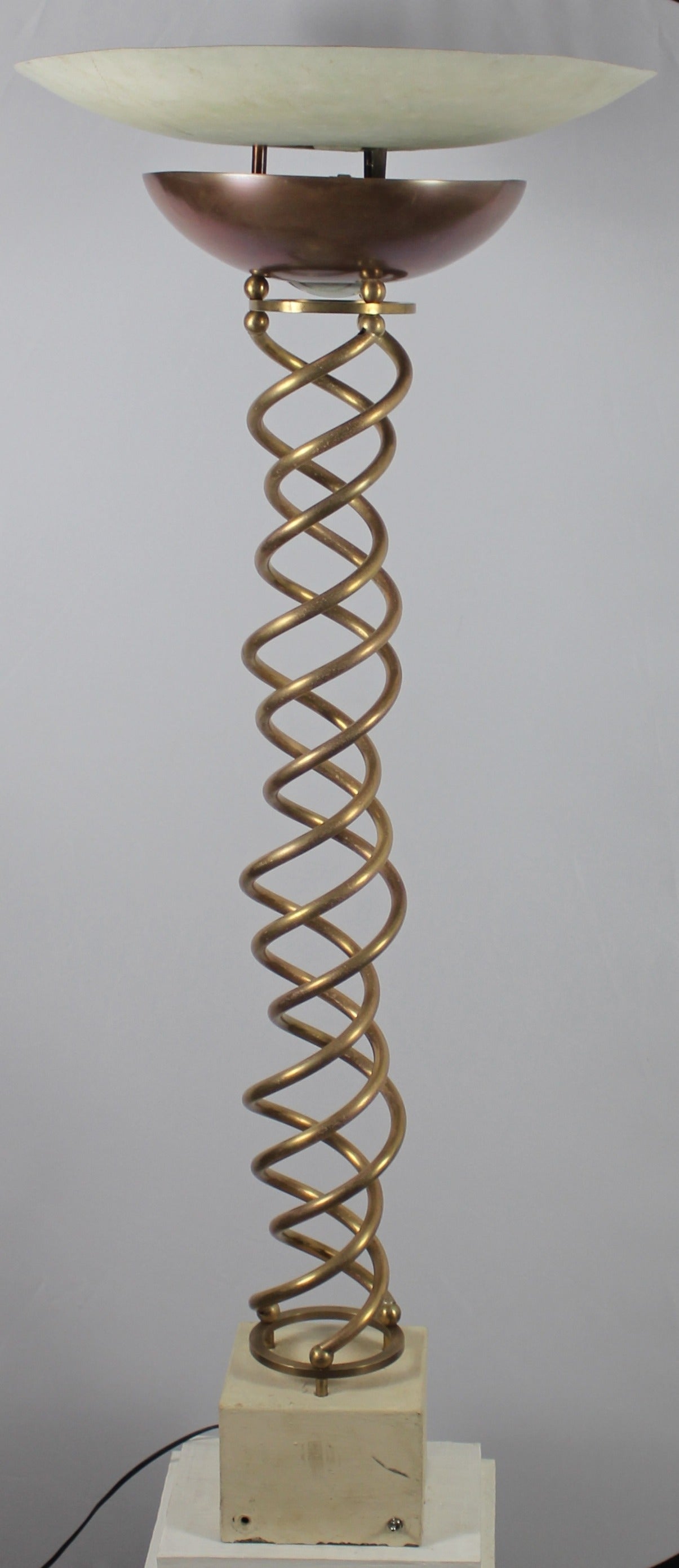 Six standing lamps of the 1930s made of iron and brass spirals