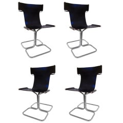 Set Of Four Tubular Chromed Steel And Black Leather Chairs.