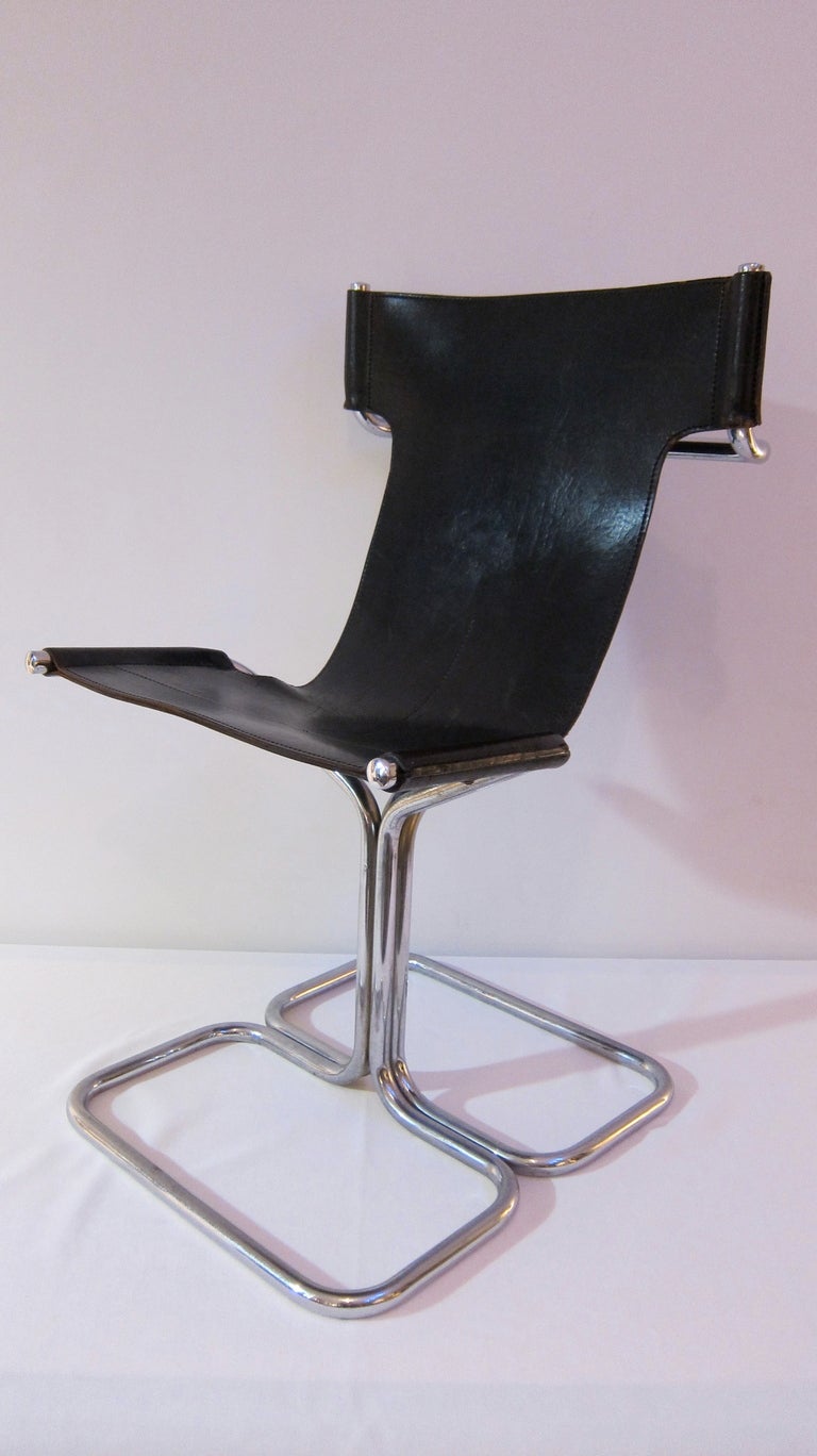 French Set Of Four Tubular Chromed Steel And Black Leather Chairs. For Sale