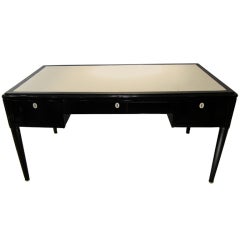 A Black Lacquered Walnut And Parchement Working Table.