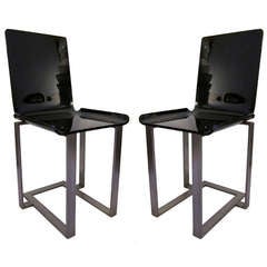 A Pair Of Chairs In Black Lucite By Marc du Plantier, Lacloche edition.