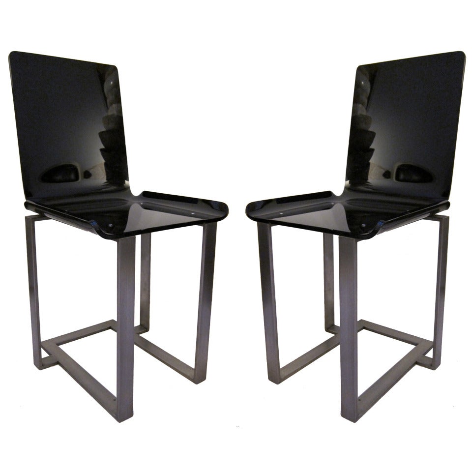 A Pair Of Chairs In Black Lucite By Marc du Plantier, Lacloche edition. For Sale