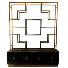 A big double face etagere or bookcase by Romeo Rega. Italy 1970