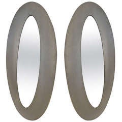A Pair Of Oval Mirrors In Aluminium And Glass By Lorenzo Burchielaro. Italy 1970