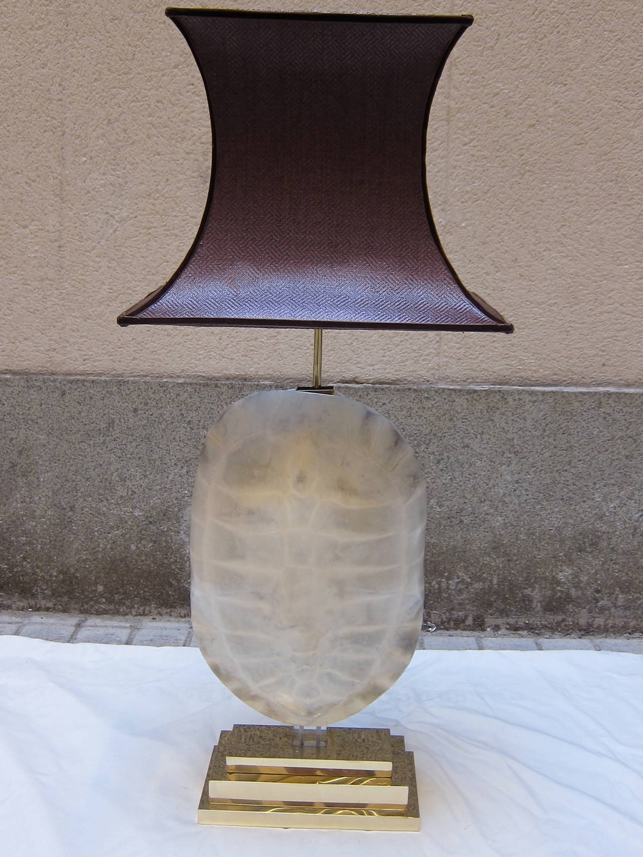 Contemporary A pair of turtle shell and guilded brass table lamps.