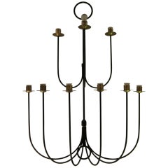 A Jean Royere Iron Chandelier. France 1950