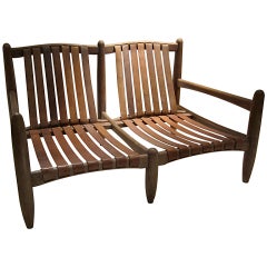 An oak and leather danish canape by Hans Wegner. Denmark 1960'.