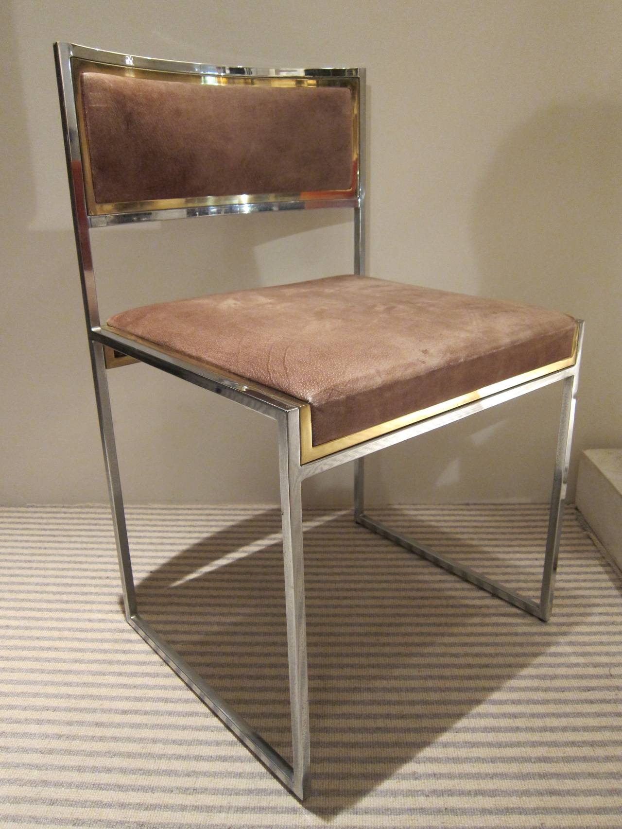 A brass and steel 4 chairs by Romeo Rega. Italy 70'