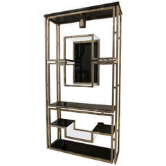Brass and black lacquer Shelving by Guy Lefevre for Maison Jansen. France, 1970s
