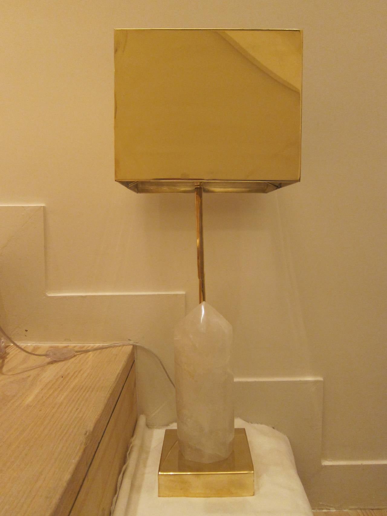 A gilded brass and quartz pair of table lamps. 2009