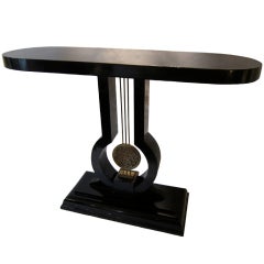A Black Lacquered And Bronze Console  Table In Ruhlmann Style.