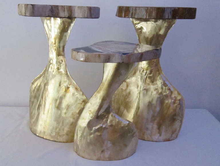 Three brass and fossil wood small table in the style of Philiphe Hiquily