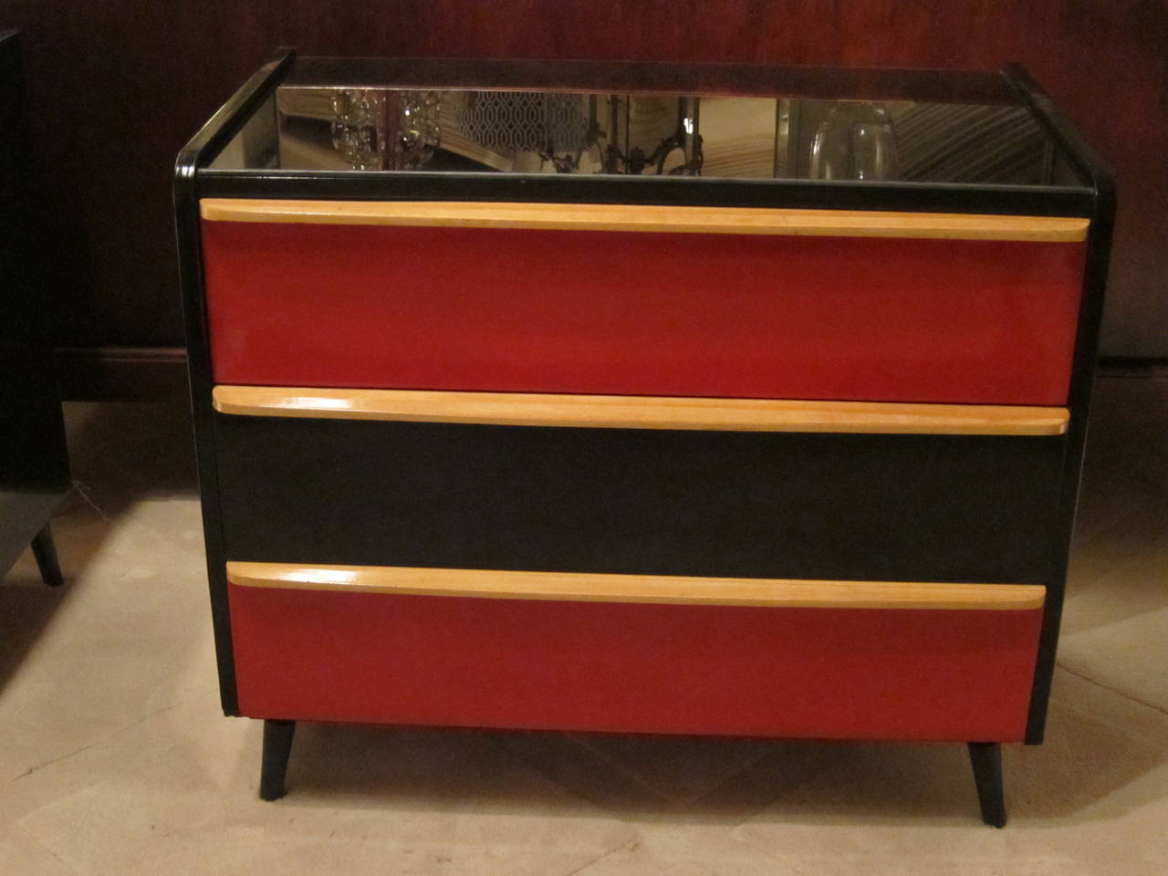 A pair of lacquered wood and glass top chest of drawers. France 60'