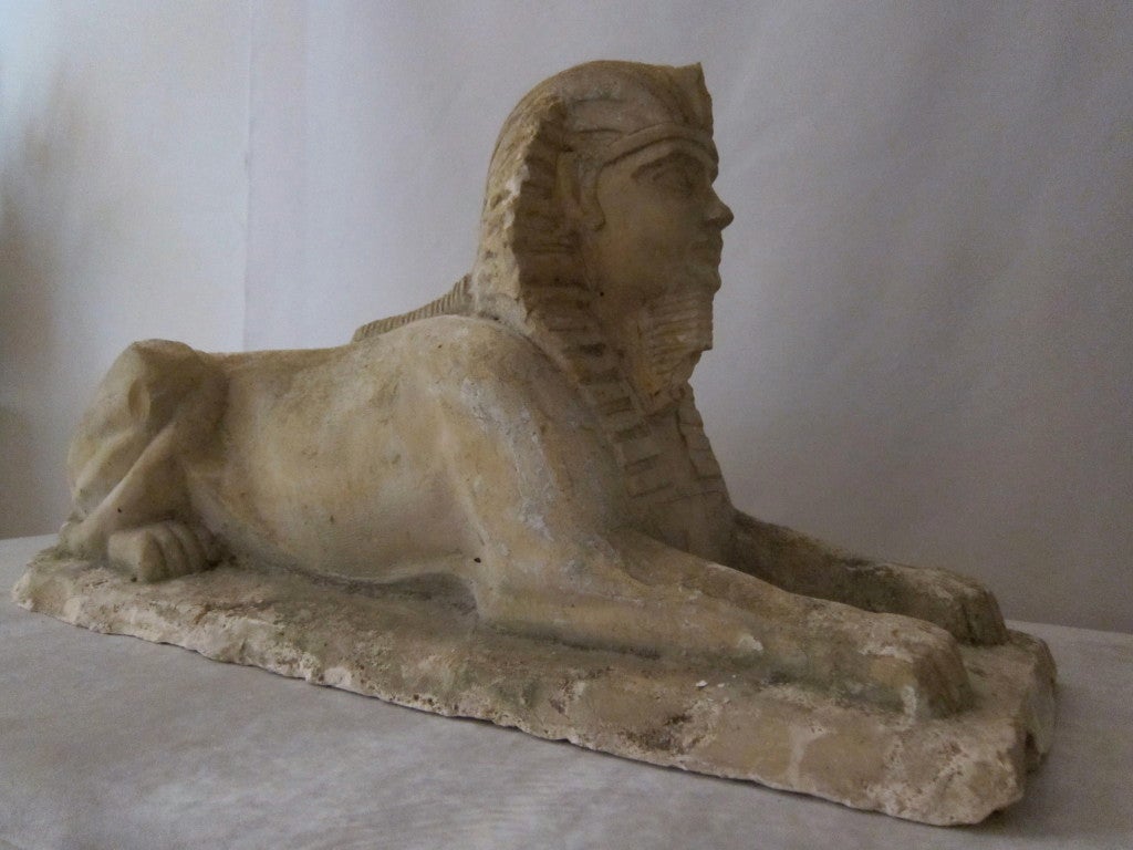 A XIXth century reconstituited stone following the Egiptian model of Tutankamon sfinge.