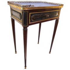 Antique A mahogany and black lacquered Louis XVI period  side table.