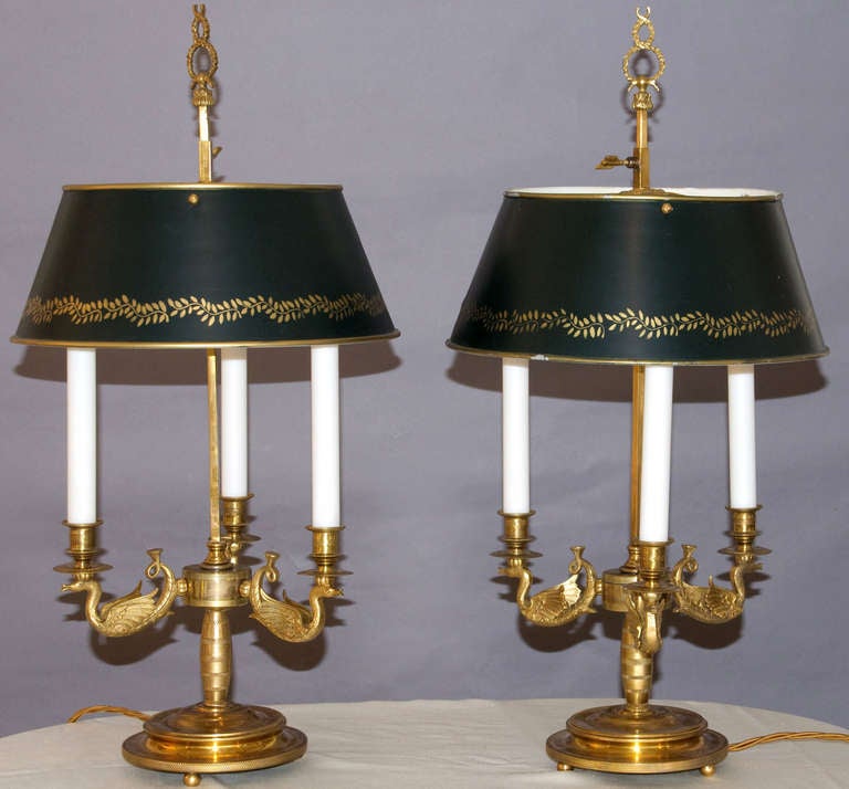 Pair of bouillotte lamps in toleware and bronze, in the French Empire manner.
