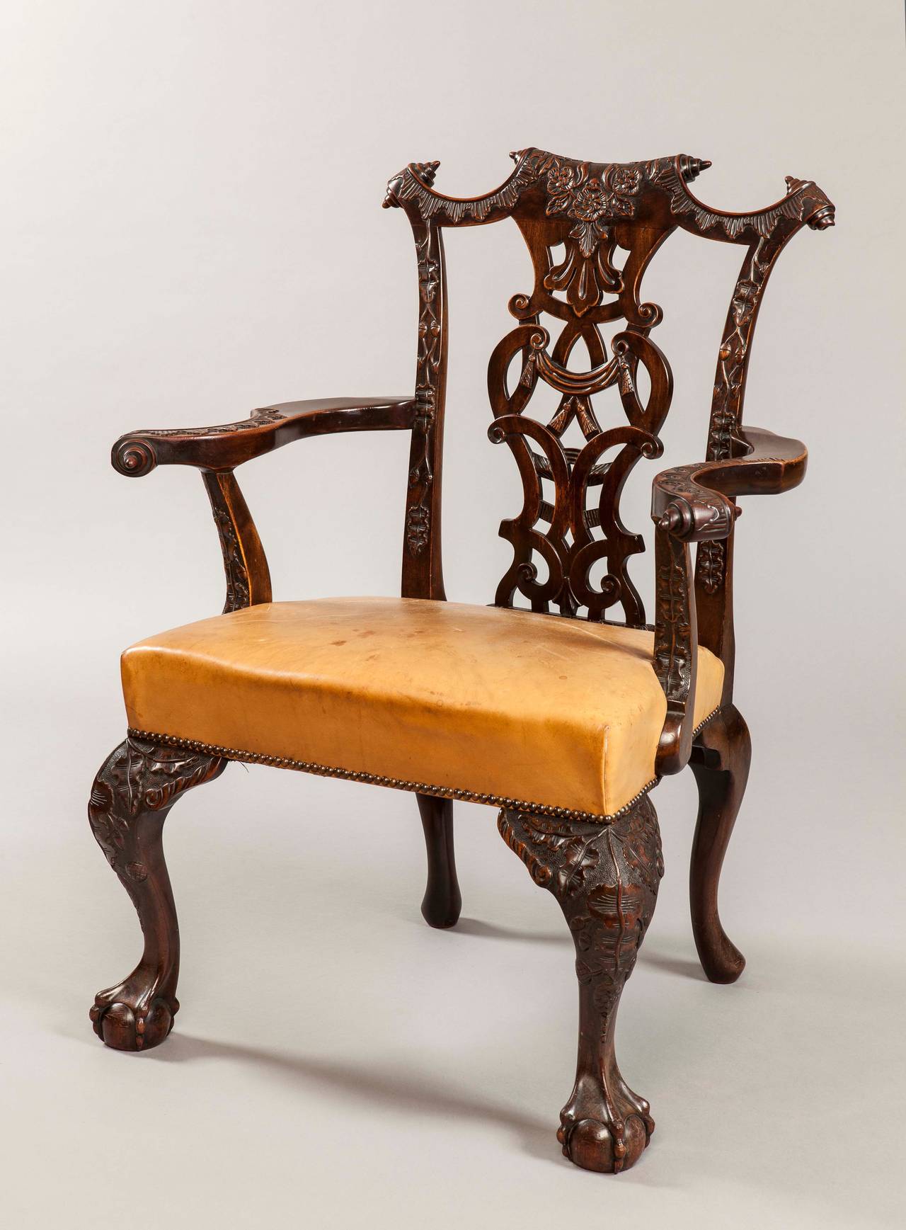 Set of 12 Mahogany Dining Chairs in the Chippendale Style