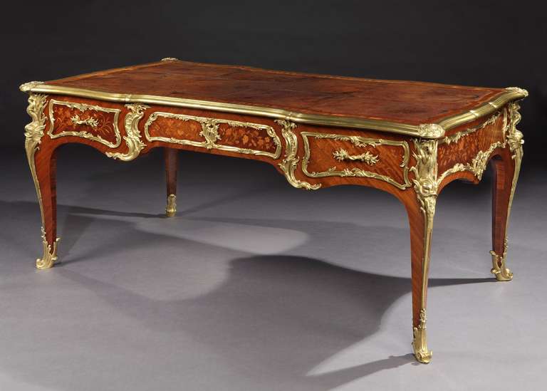 Of freestanding form, constructed in Kingwood, with extensive use of marquetry inlay, and very fine gilt bronze mounts, some signed ‘AB’ to the back: rising from cabriole legs, shod with sabots which are conjoined by gilt bronze interstices to most