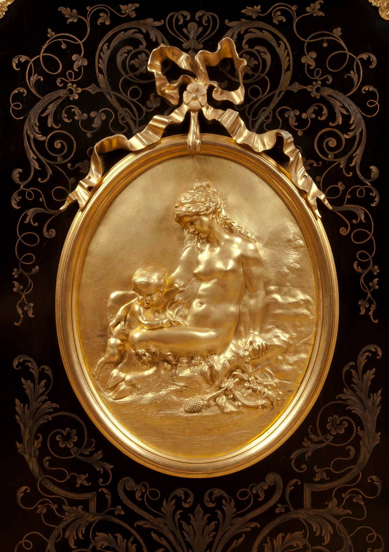 An extremely fine pair of French cabinets in the Louis XVIth manner.
By Henri Picard.

Constructed in ebony with extensive and well executed cut brass decorative inlay work, and gilt bronze ornamentation; rising from toupie bronze dressed feet,